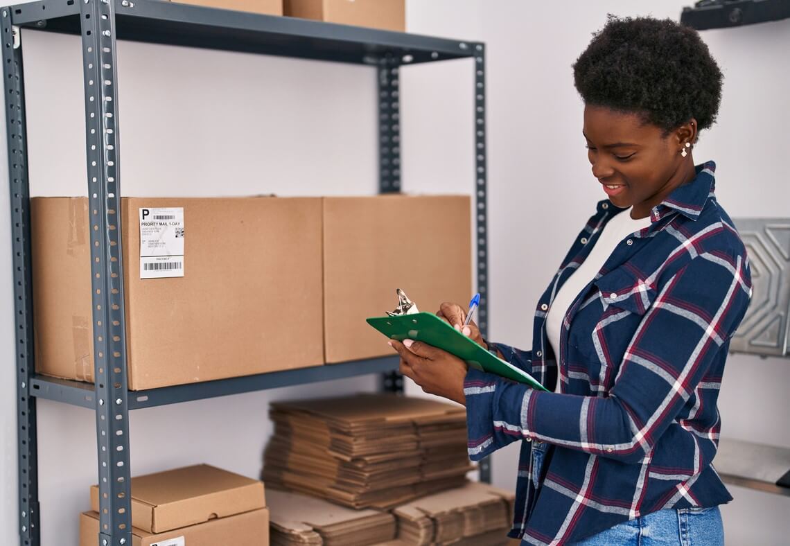 An entrepreneur managing her inventory in a self storage unit.