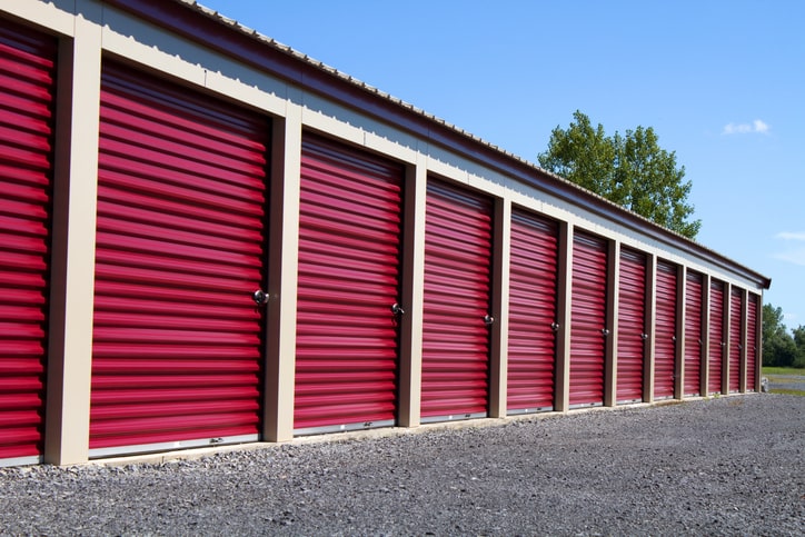 A row of self storage units in an outdoor setting.