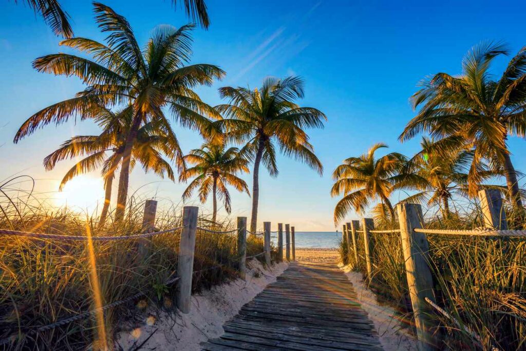 A sunrise view of a passage to the beach in Seaside, FL.